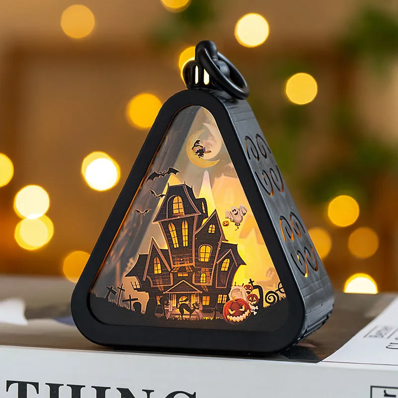 A Halloween decoration pumpkin lamp prop in plastic and glass, showing one of the four colour design options.