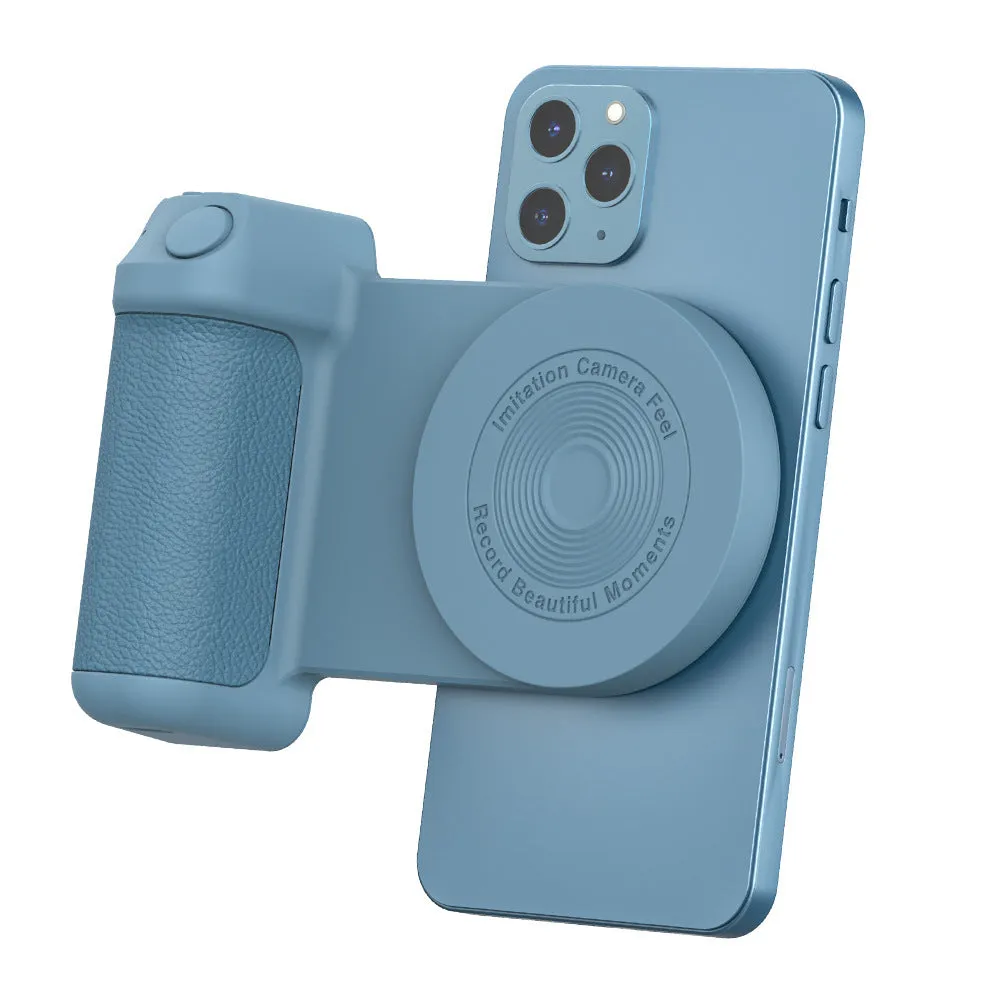 Black magnetic phone camera holder with rotatable bracket and ergonomic leather handle on a table.