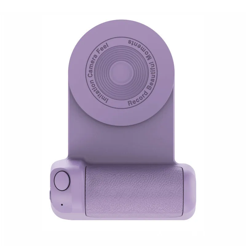 Black magnetic phone camera holder with rotatable bracket and ergonomic leather handle on a table.