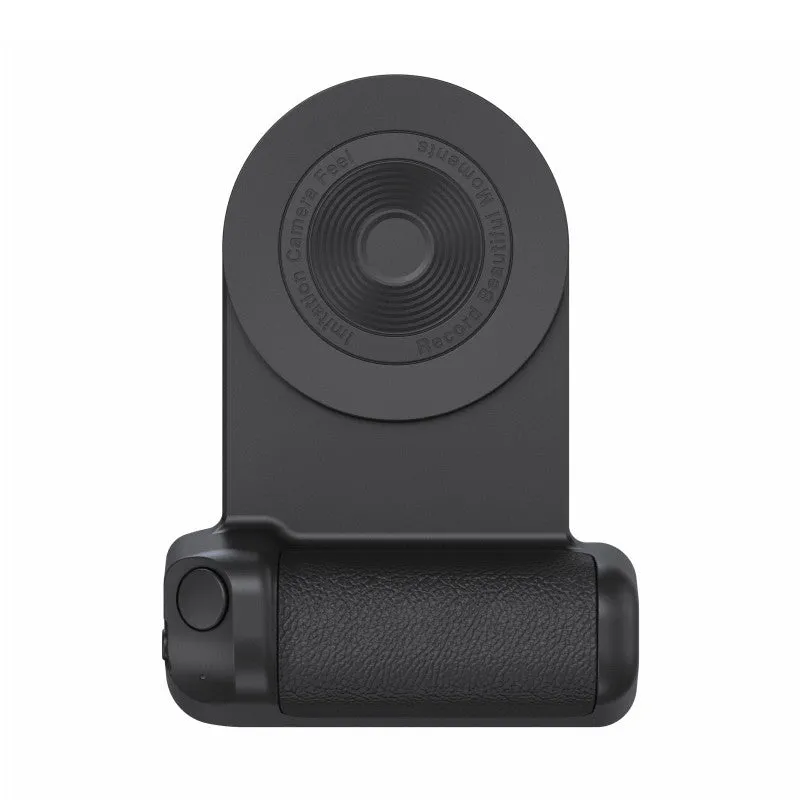 Black magnetic phone camera holder with rotatable bracket and ergonomic leather handle on a table.