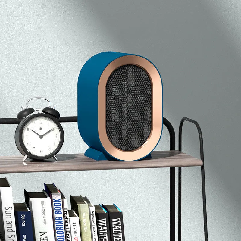 Black desktop electric heater with ceramic heating element and mechanical controls