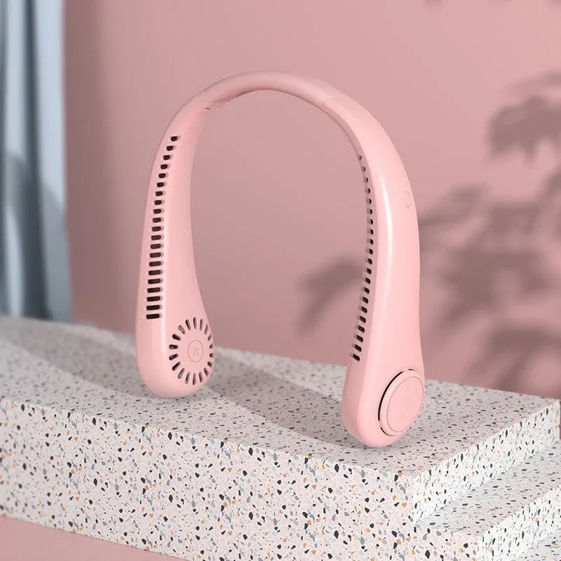 Blue bladeless neck fan hanging around a person's neck, showing the USB charging port and control buttons.