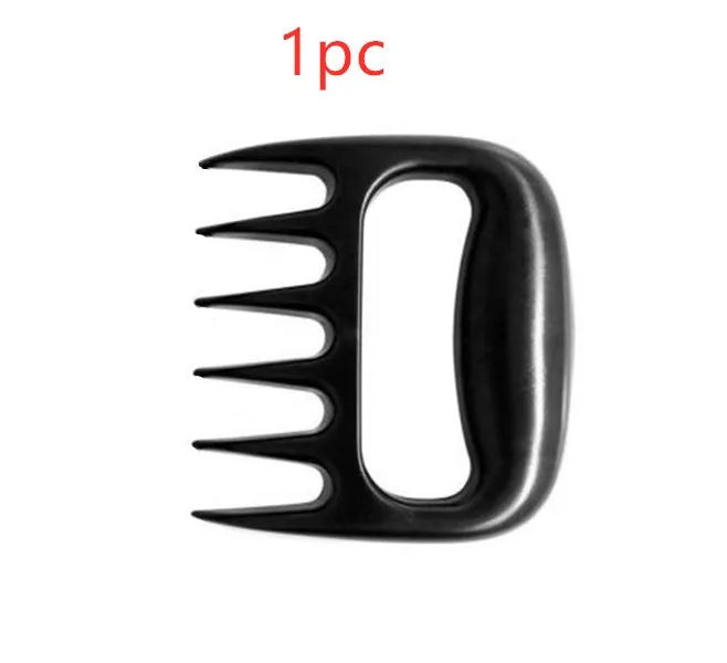 Two black bear claw meat shredders for BBQ preparation on a kitchen counter.