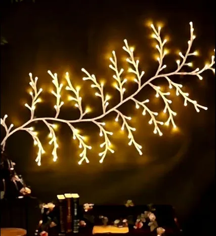 Flexible LED willow vine light garland with warm white lights on textured branches