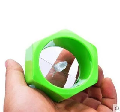 Yellow and green spiral vegetable cutter made from food-grade ABS plastic for cucumbers