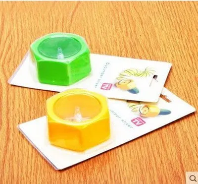 Yellow and green spiral vegetable cutter made from food-grade ABS plastic for cucumbers