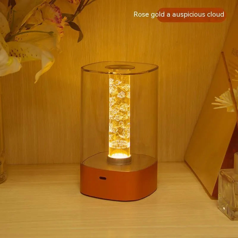 Rose gold touch-control LED bedside lamp with decorative conch pattern and USB charging cable