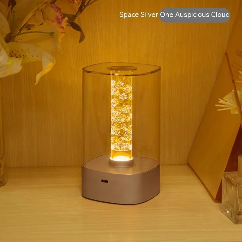 Rose gold touch-control LED bedside lamp with decorative conch pattern and USB charging cable
