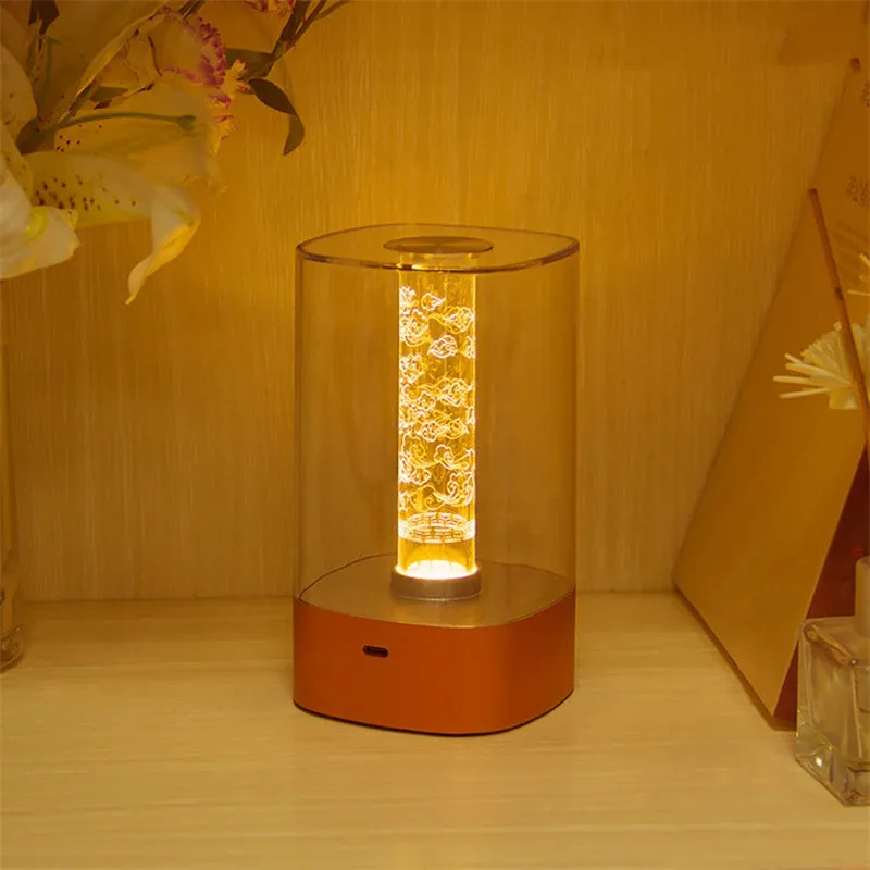 Rose gold touch-control LED bedside lamp with decorative conch pattern and USB charging cable