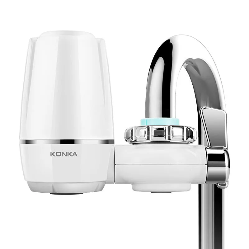 White plastic kitchen tap water filter with ceramic cartridge and universal screw thread adapters