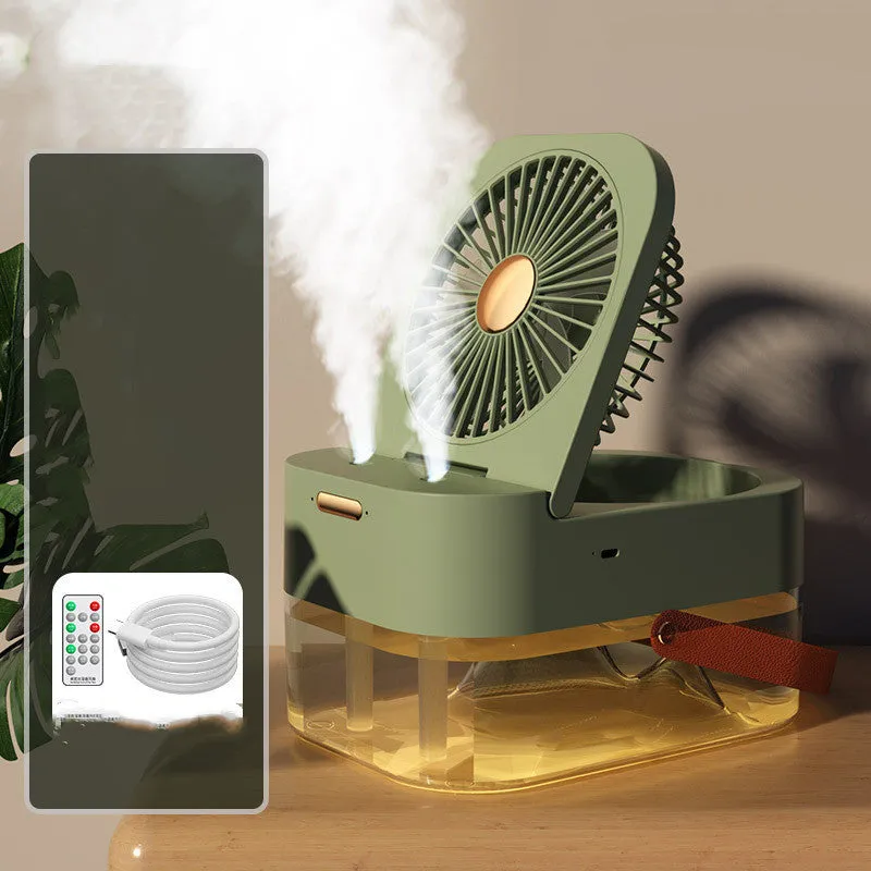 Pearl white desktop humidifier cooling fan with water tank, remote control, and night light on a wooden desk.