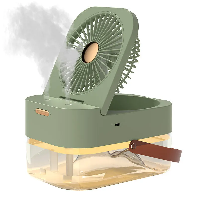 Pearl white desktop humidifier cooling fan with water tank, remote control, and night light on a wooden desk.