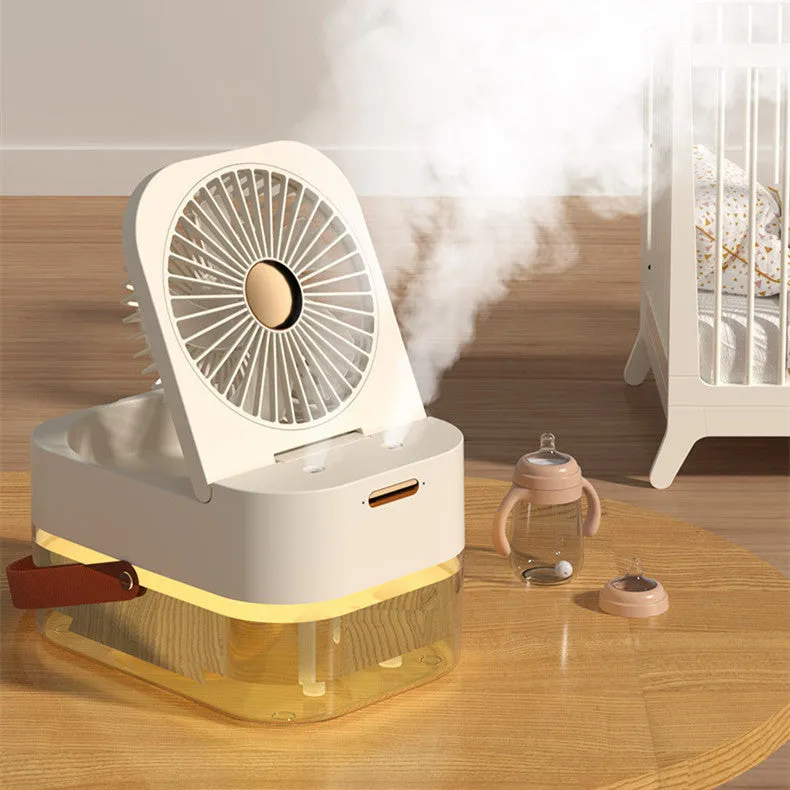 Pearl white desktop humidifier cooling fan with water tank, remote control, and night light on a wooden desk.