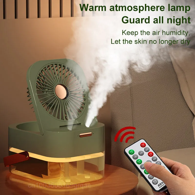Pearl white desktop humidifier cooling fan with water tank, remote control, and night light on a wooden desk.