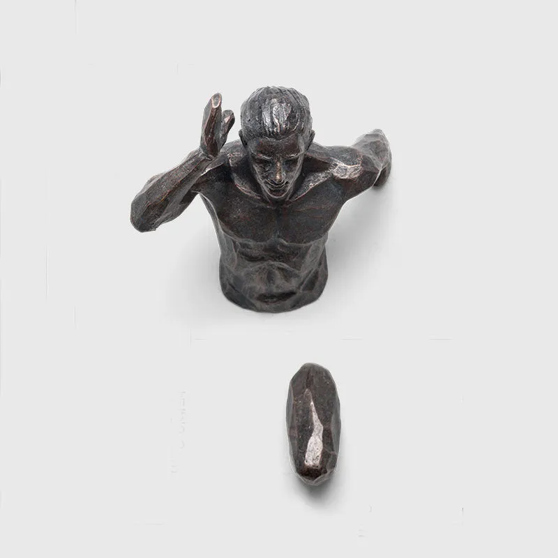Modern resin character sculpture wall hanging decoration in a metallic finish