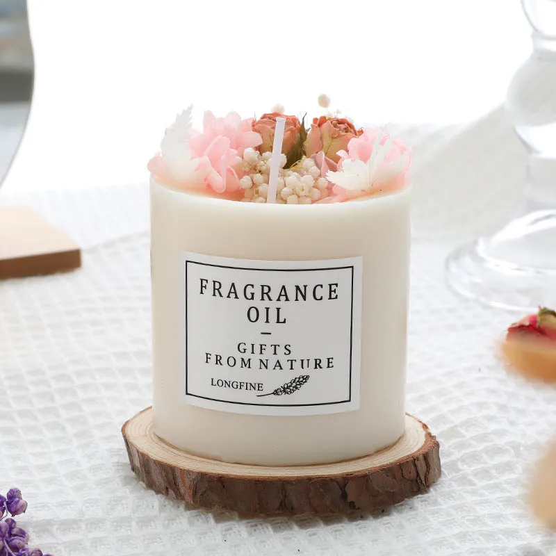 Dried flowers decor romantic aromatherapy candle in a jar with embedded botanicals.