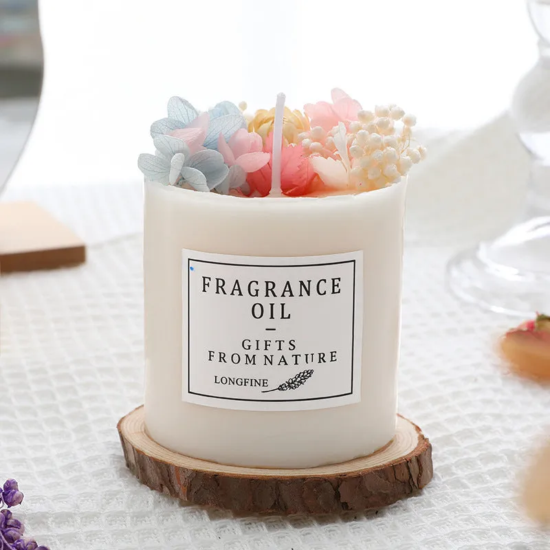 Dried flowers decor romantic aromatherapy candle in a jar with embedded botanicals.