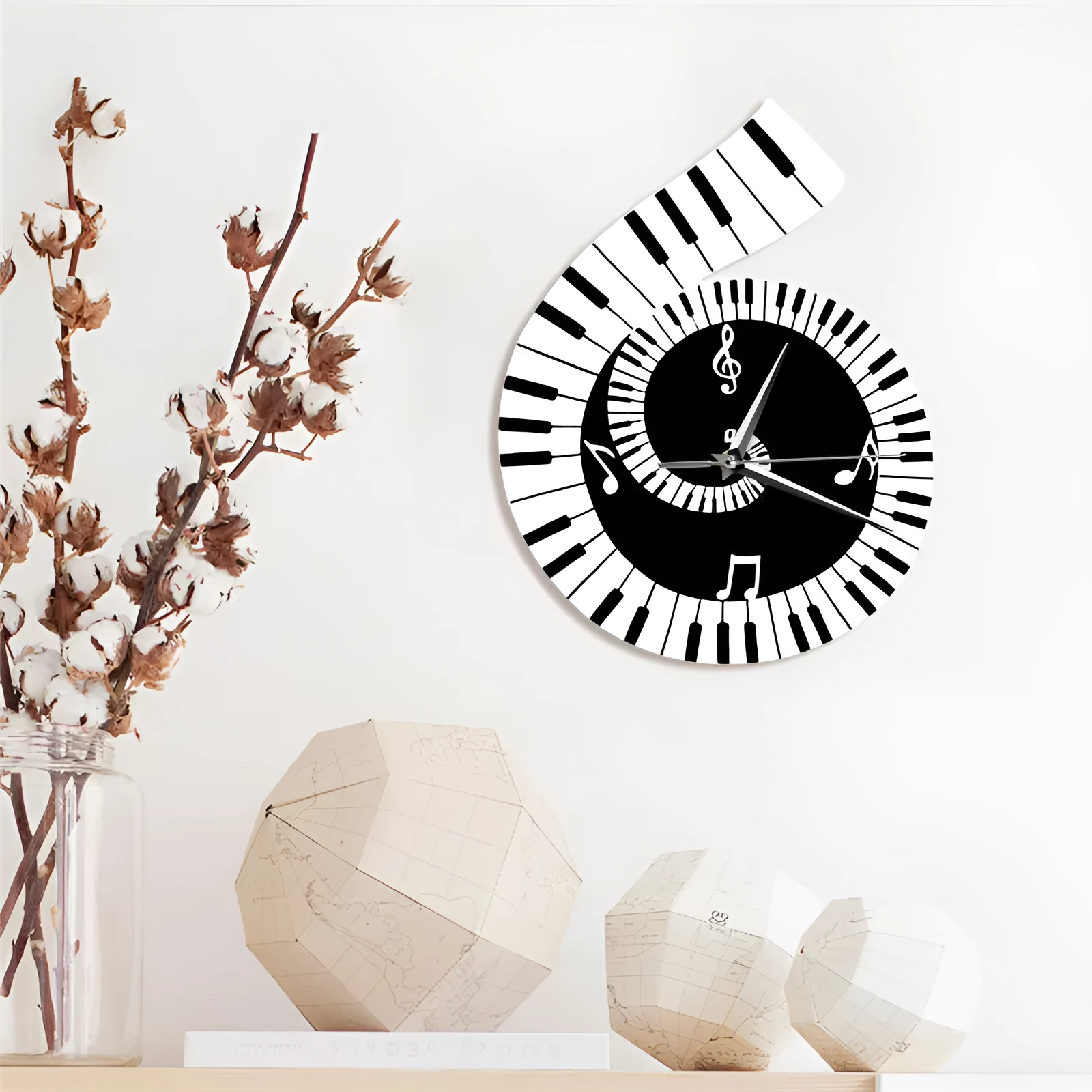 Black and white treble clef shaped wall clock with piano keyboard and musical note decoration