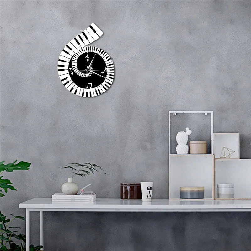 Black and white treble clef shaped wall clock with piano keyboard and musical note decoration