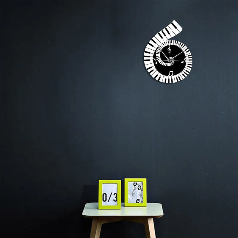 Black and white treble clef shaped wall clock with piano keyboard and musical note decoration