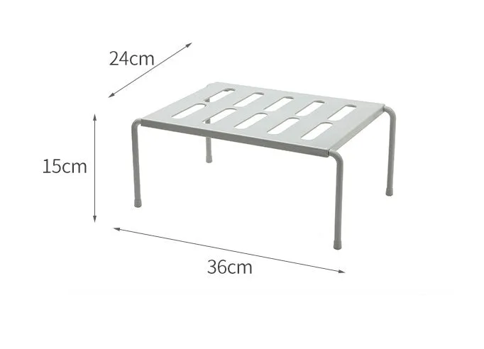 White telescopic kitchen rack with adjustable height showing extended and compressed positions