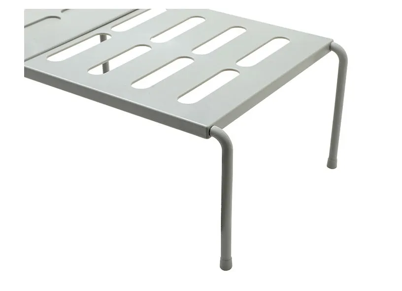 White telescopic kitchen rack with adjustable height showing extended and compressed positions