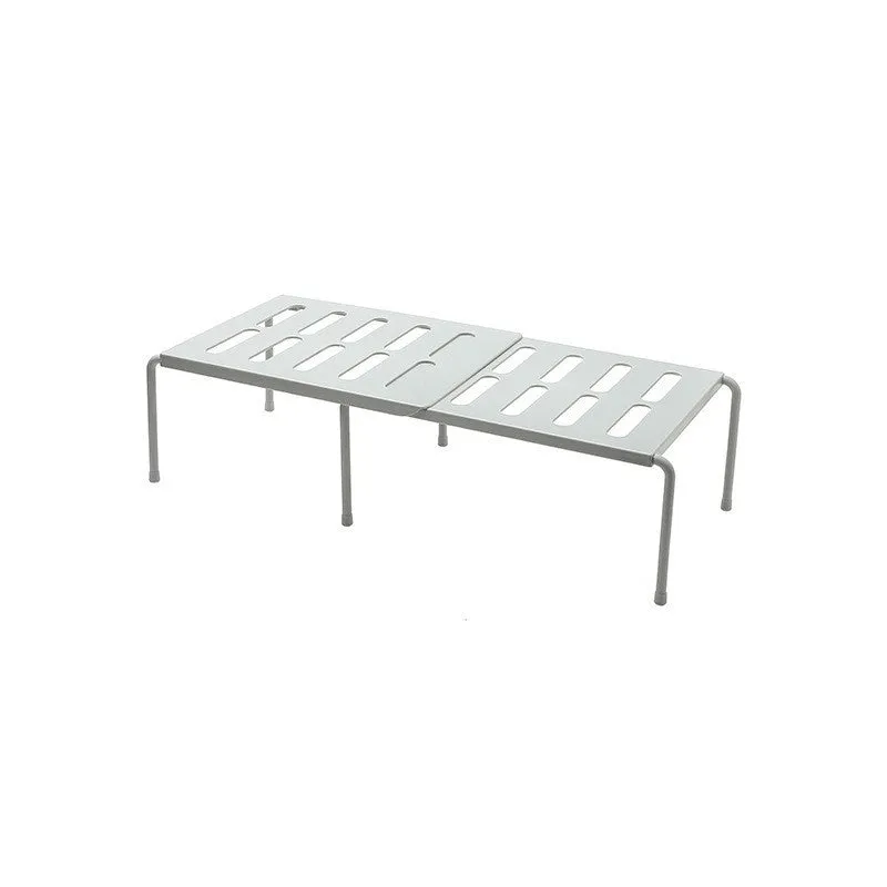 White telescopic kitchen rack with adjustable height showing extended and compressed positions