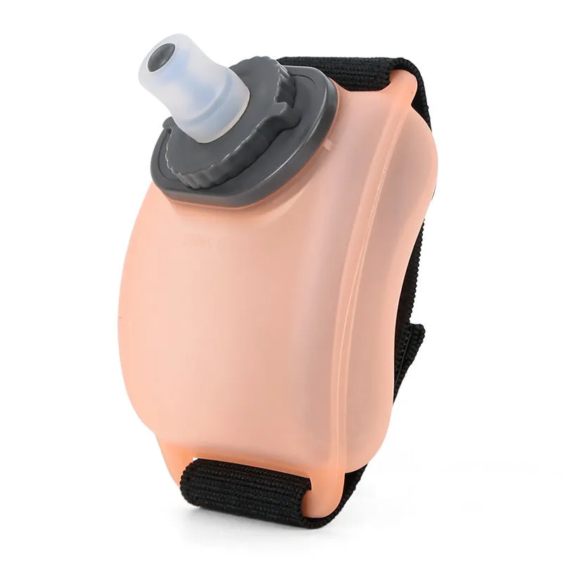 Orange wrist-mounted sports water bottle with Velcro strap for cycling and running hydration