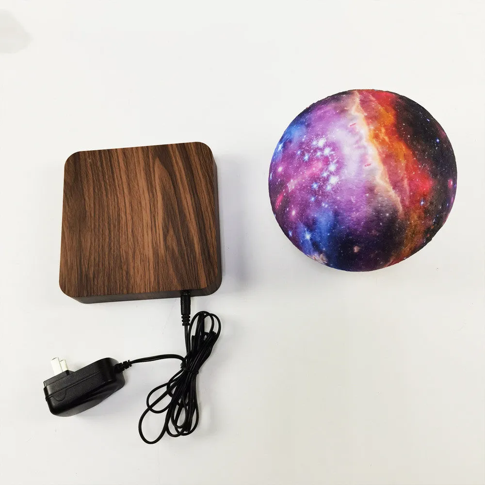 Magnetic levitation galaxy decorative light with floating 14 cm moon lamp above square walnut base