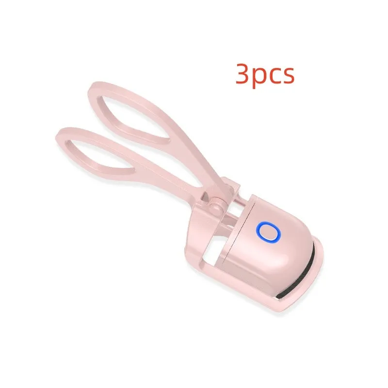 White USB heated eyelash curler with dual temperature buttons and safety insulating slots.