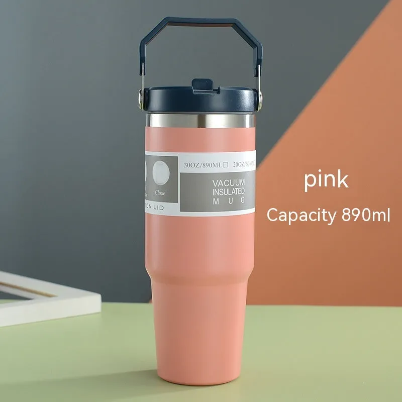 30oz insulated stainless steel travel tumbler with handle, shown in dark pink with a black sliding lid.