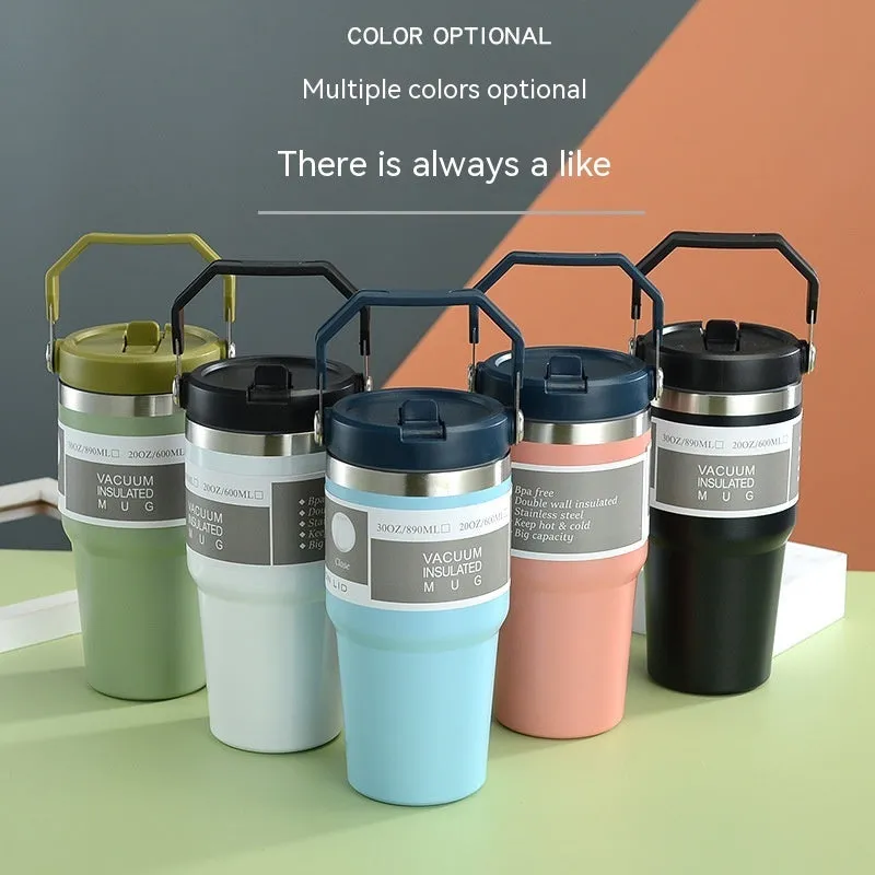 30oz insulated stainless steel travel tumbler with handle, shown in dark pink with a black sliding lid.