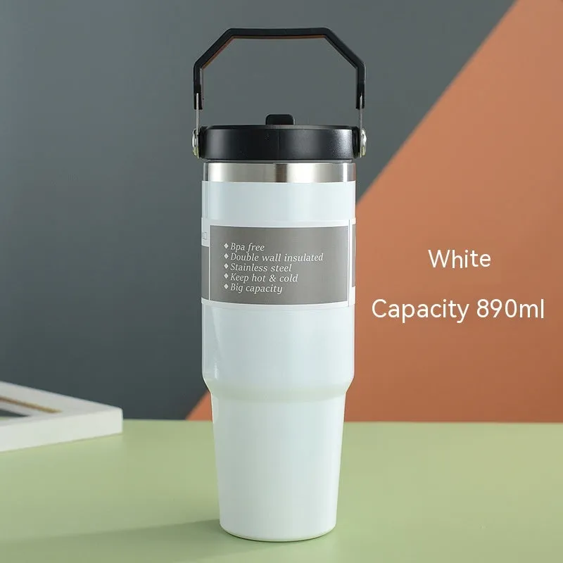 30oz insulated stainless steel travel tumbler with handle, shown in dark pink with a black sliding lid.