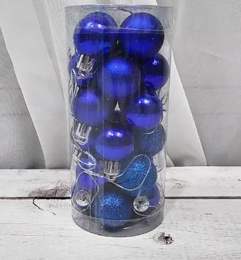 Assorted shiny red, gold, silver, and blue 3 cm Christmas baubles in a box and a storage barrel.