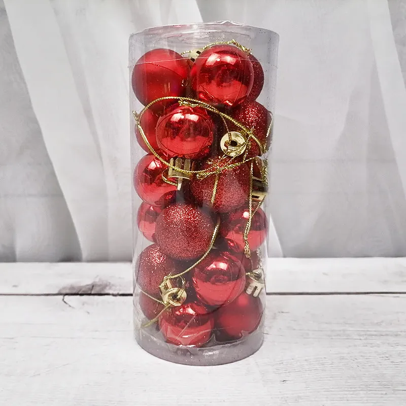 Assorted shiny red, gold, silver, and blue 3 cm Christmas baubles in a box and a storage barrel.
