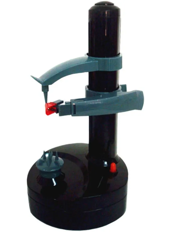 White electric fruit and vegetable peeler with stainless steel blades on a kitchen counter.