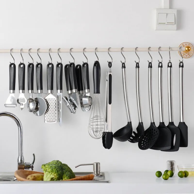 Black silicone spatula and spoon set with stainless steel handles - 16-piece kitchen utensil collection