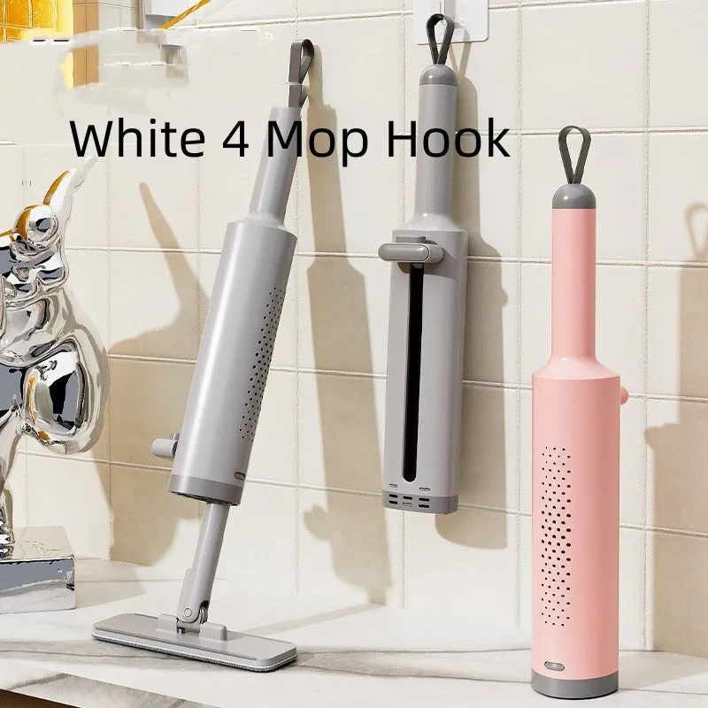 Pink rotatable self-squeeze mini flat mop with microfiber pad, shown extended to its full length.