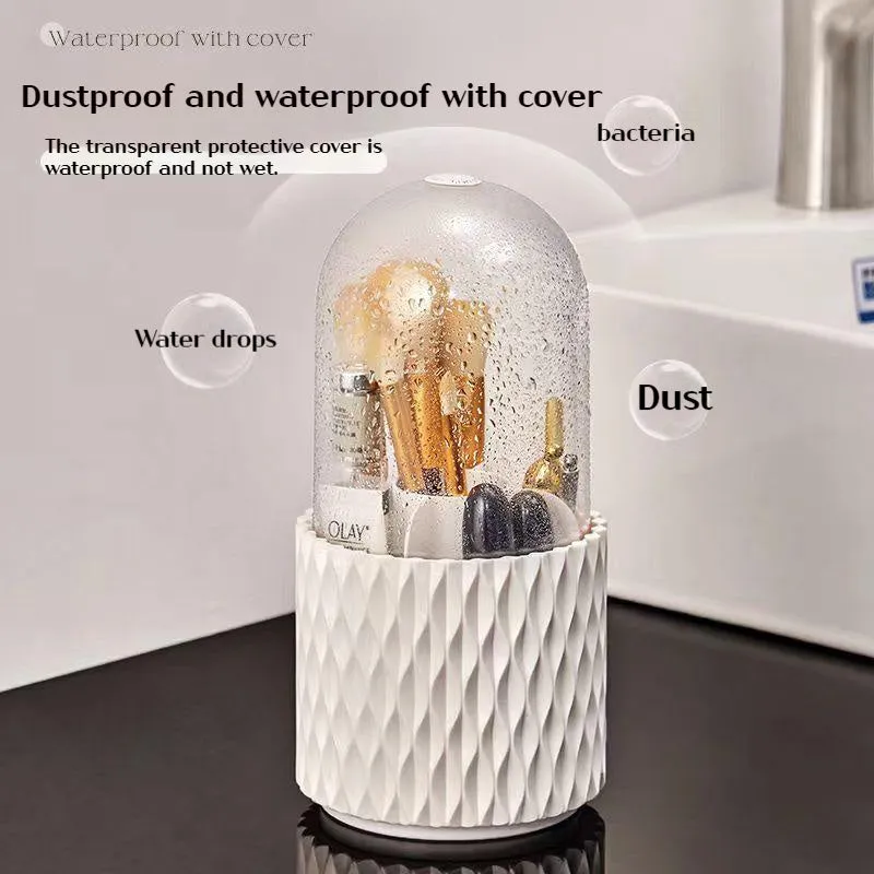 White rotating acrylic makeup brush storage box with transparent dust cover on desktop