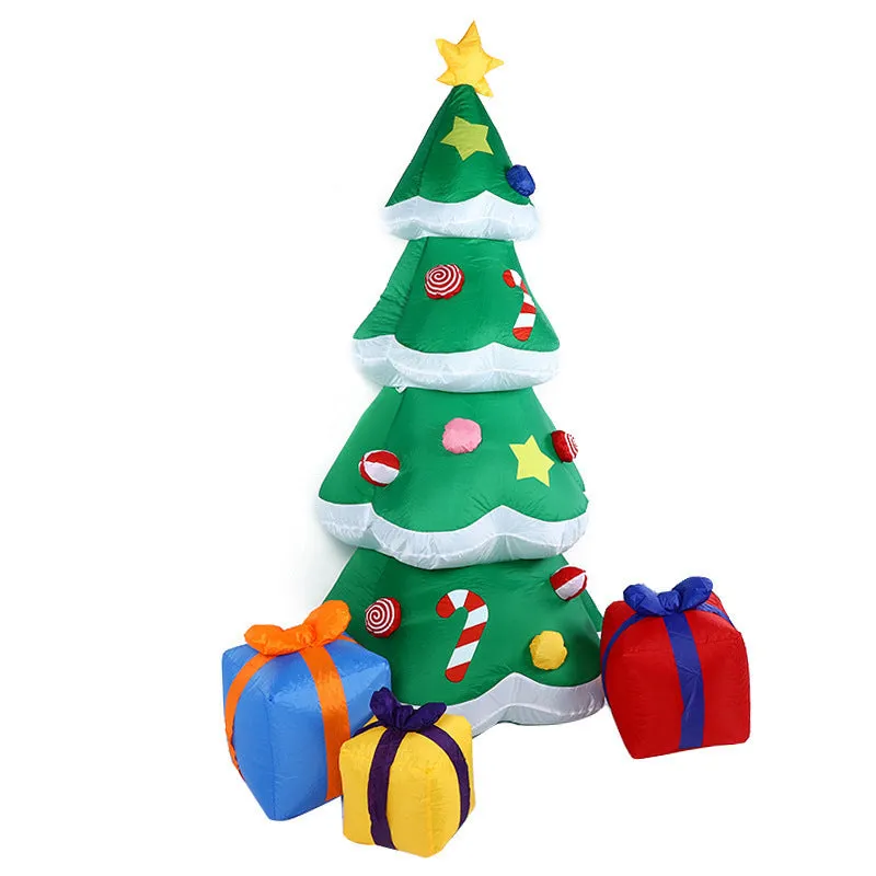 Glowing LED inflatable Christmas decorations including Santa, snowman, and a Christmas tree for outdoor garden use.