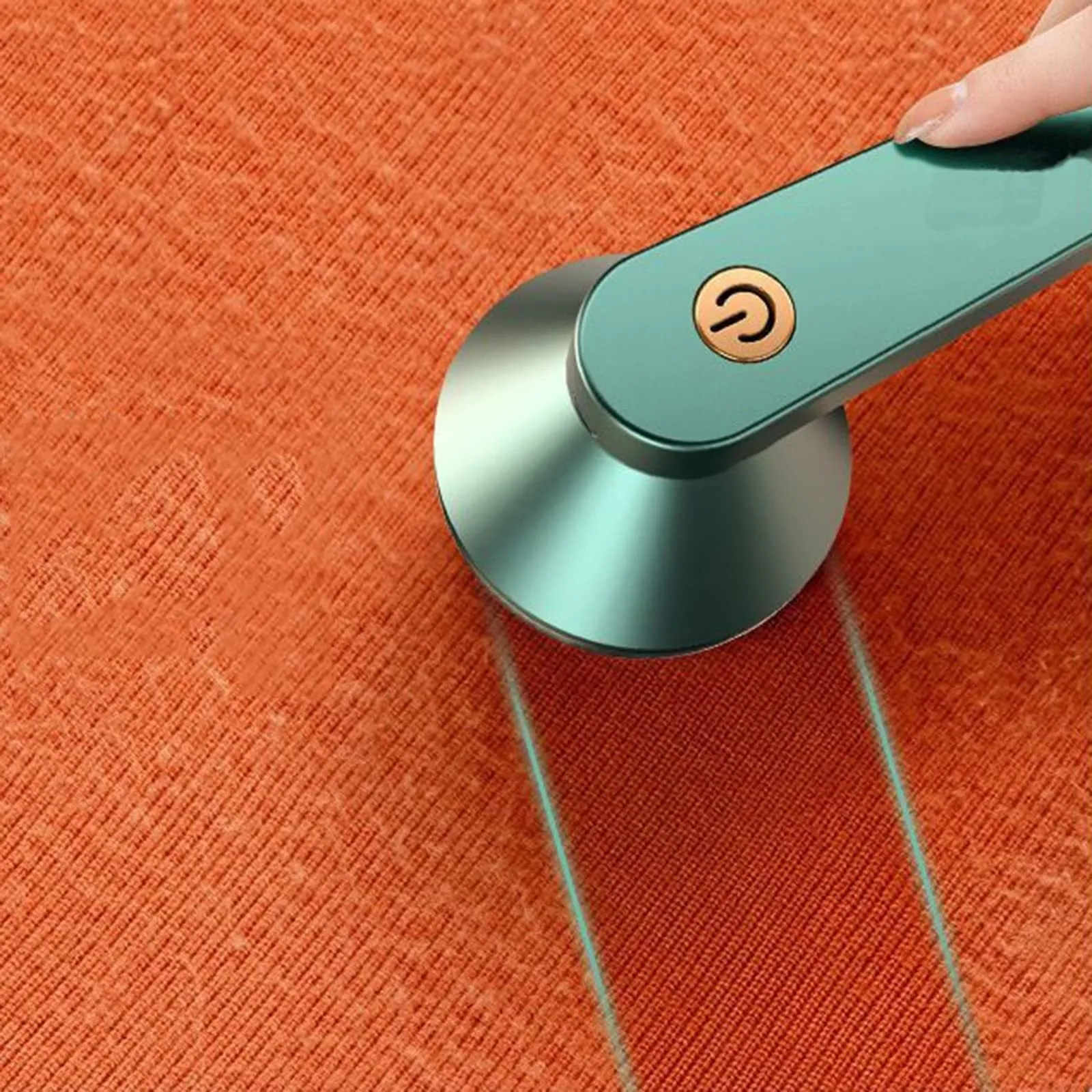 Green and white USB rechargeable electric lint remover with removable lint collector container.
