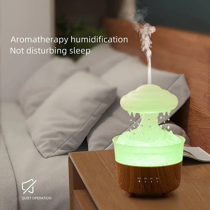 Wood grain white rain cloud shaped humidifier, diffuser, and night light on a table.