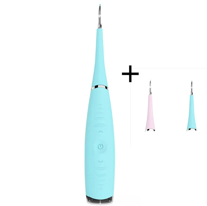 Pink or blue waterproof electric toothbrush care tool for removing dental calculus on a bathroom counter.