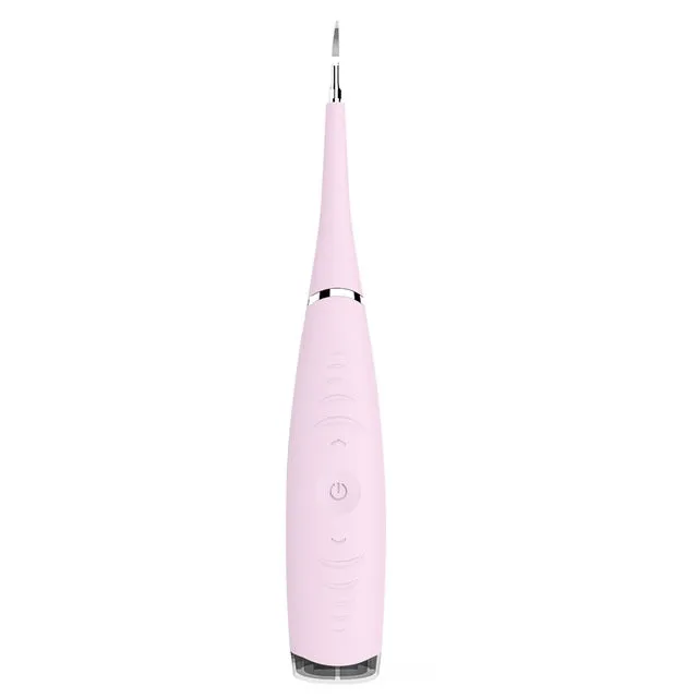 Pink or blue waterproof electric toothbrush care tool for removing dental calculus on a bathroom counter.