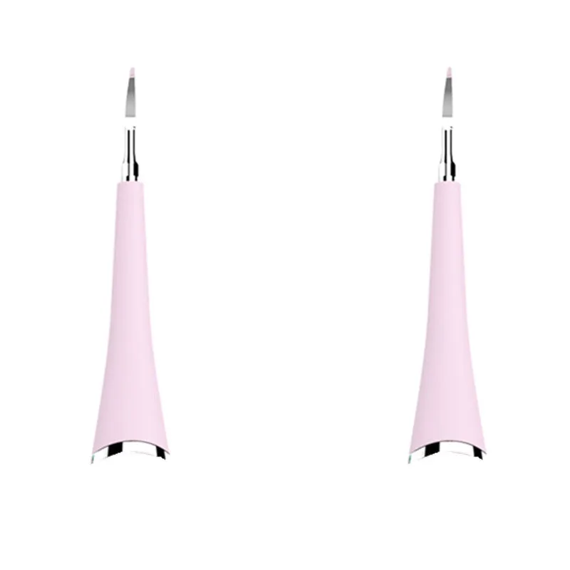 Pink or blue waterproof electric toothbrush care tool for removing dental calculus on a bathroom counter.