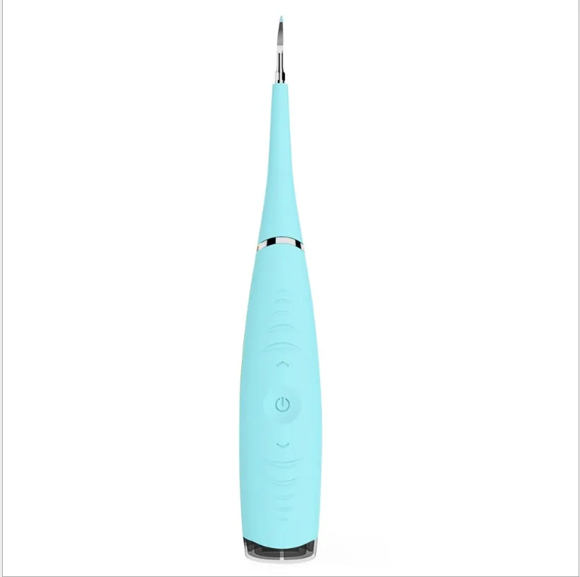 Pink or blue waterproof electric toothbrush care tool for removing dental calculus on a bathroom counter.