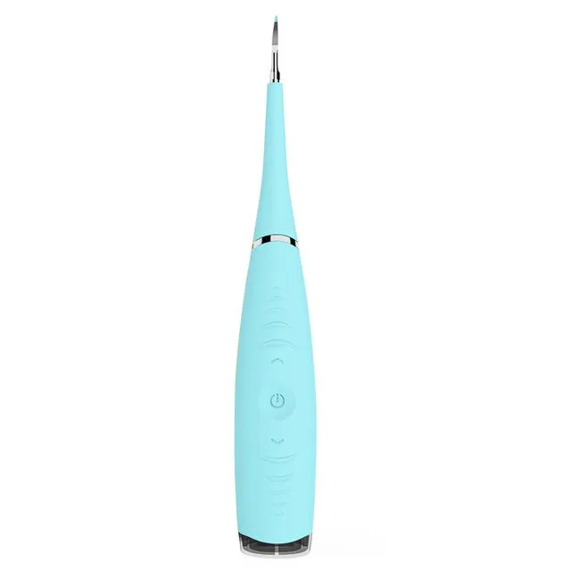 Pink or blue waterproof electric toothbrush care tool for removing dental calculus on a bathroom counter.