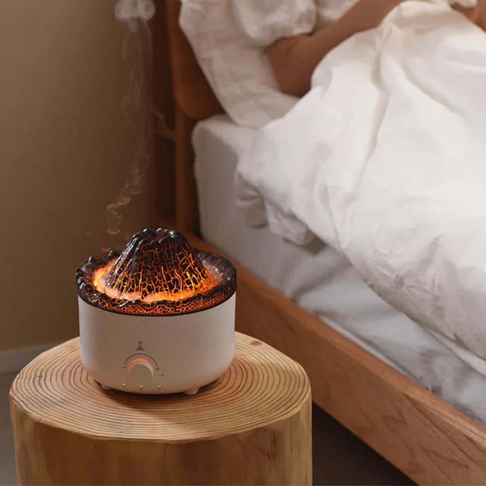 White volcano-shaped humidifier with flame effect lighting and remote control