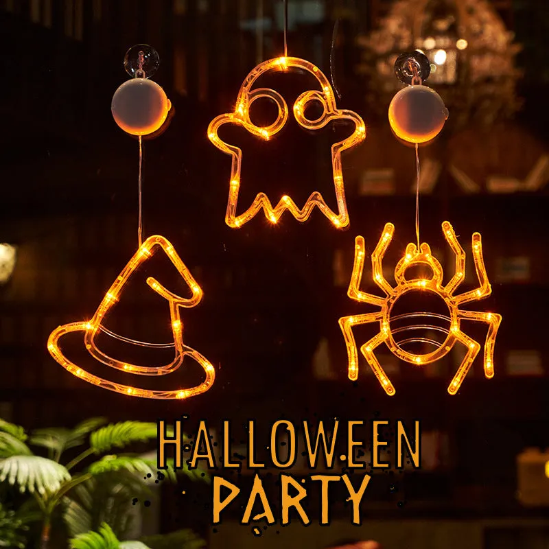 Halloween LED window lights with suction cups showing ghost, spider, and pumpkin decorations