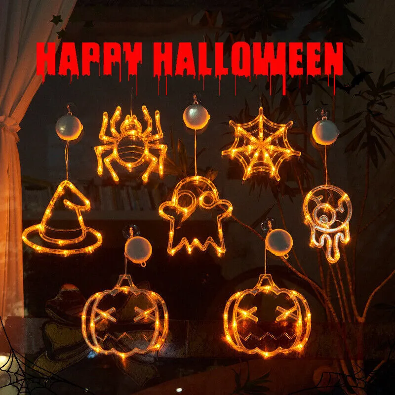 Halloween LED window lights with suction cups showing ghost, spider, and pumpkin decorations